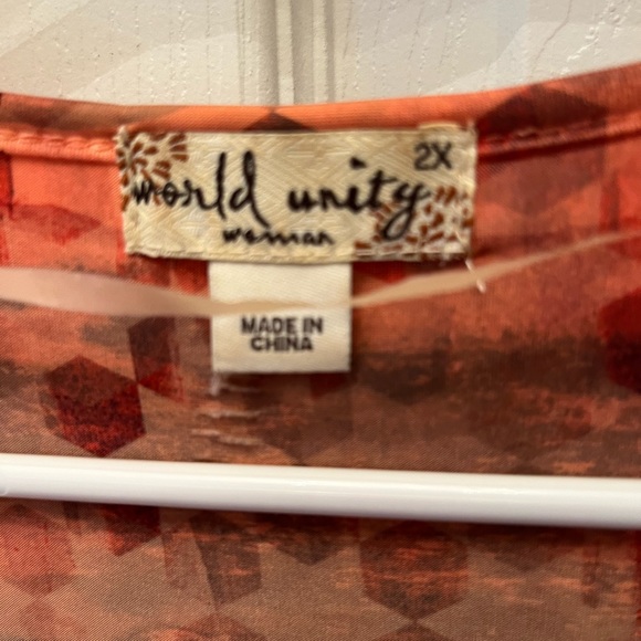 Brand… world unity blouse in a few tones of color. Front is 25” long and - Picture 3 of 4